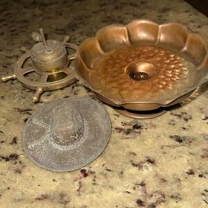 four metal decorative items